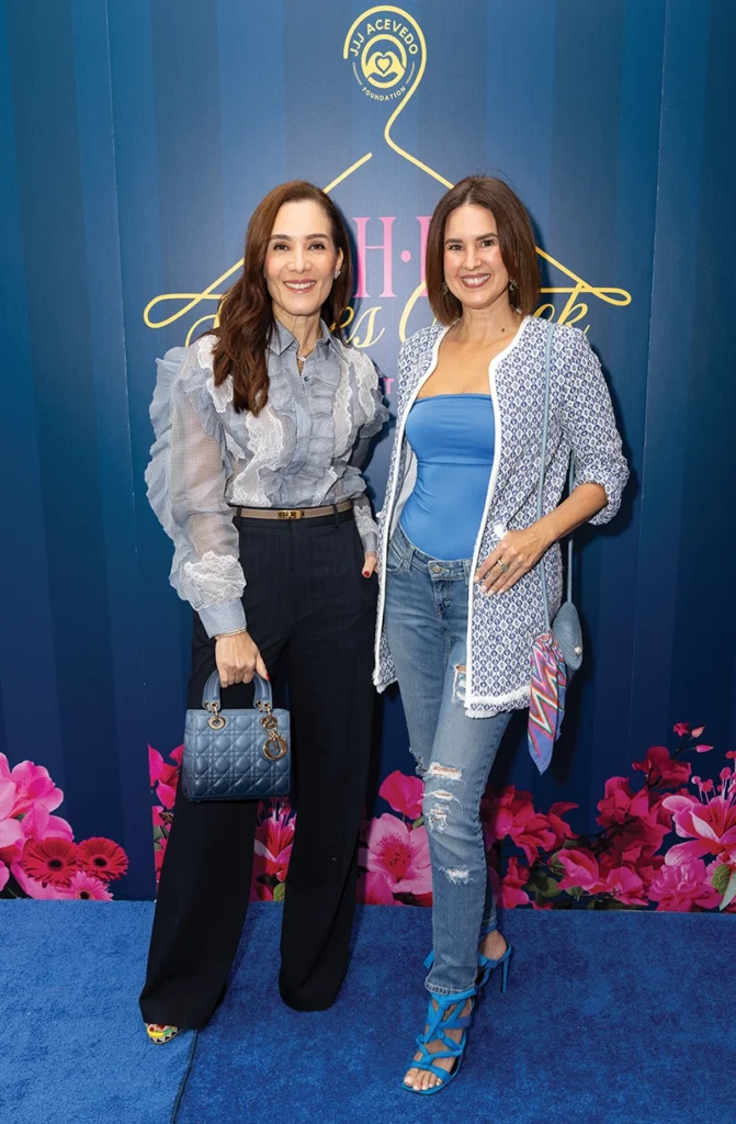 Two women smiling.
