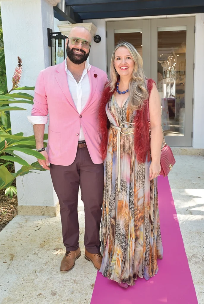 Attractive couple smiling at camera.
